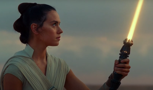 Rey with a yellow lightsaber in 
