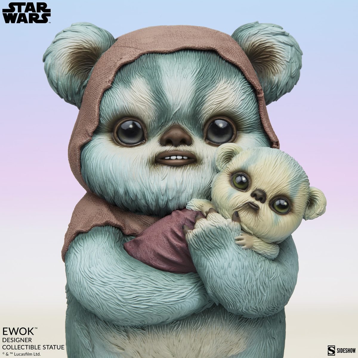 Close up of Ewok holding a baby statue