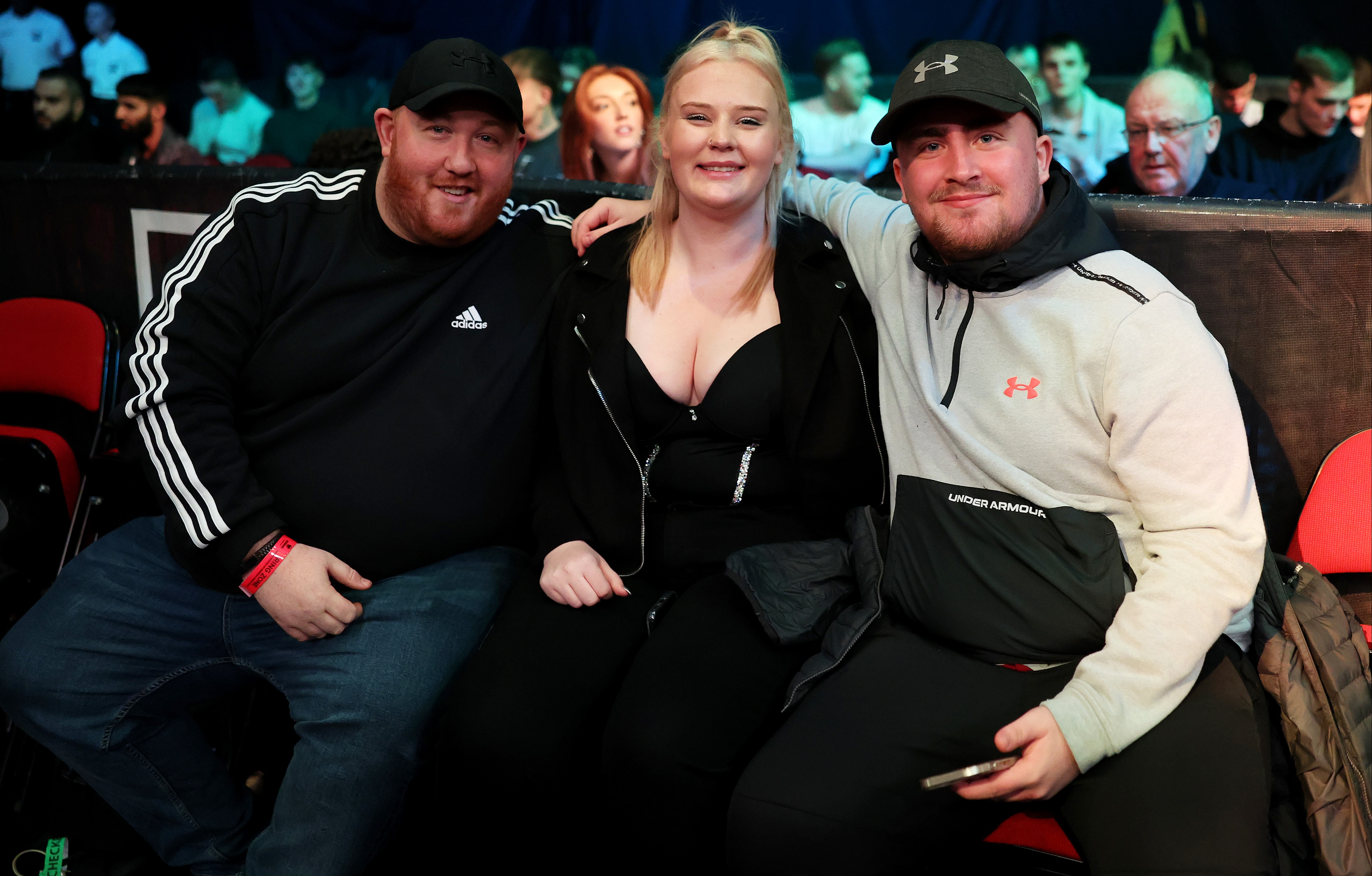 The darts wonderkid attended the event with girlfriend Eloise, centre