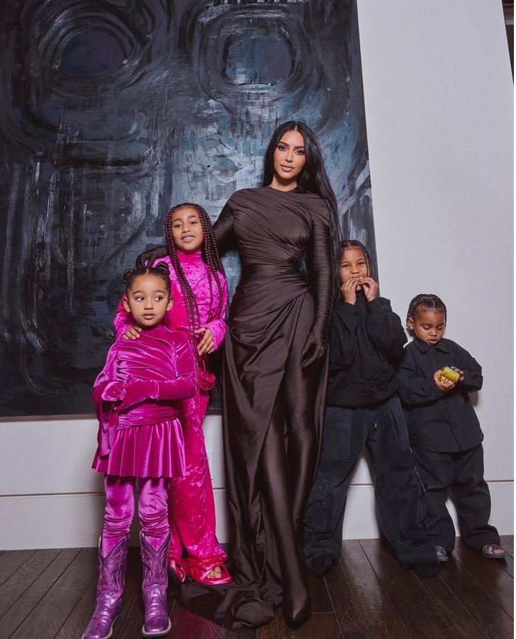 Kim pictured with her children in December 2021