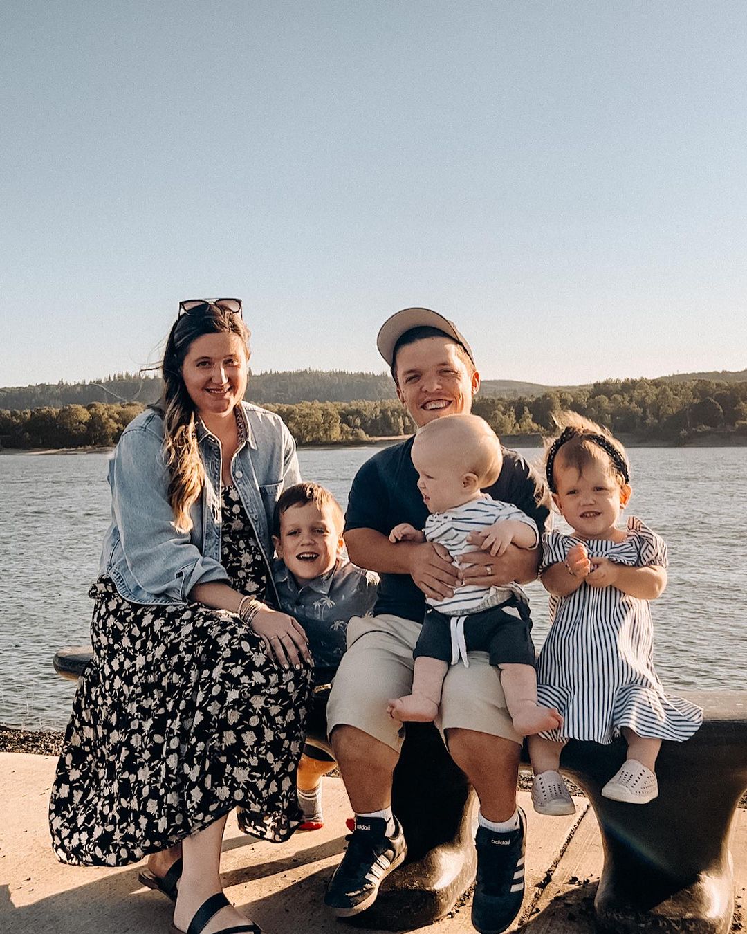 Tori and Zach took a group photo with their three children