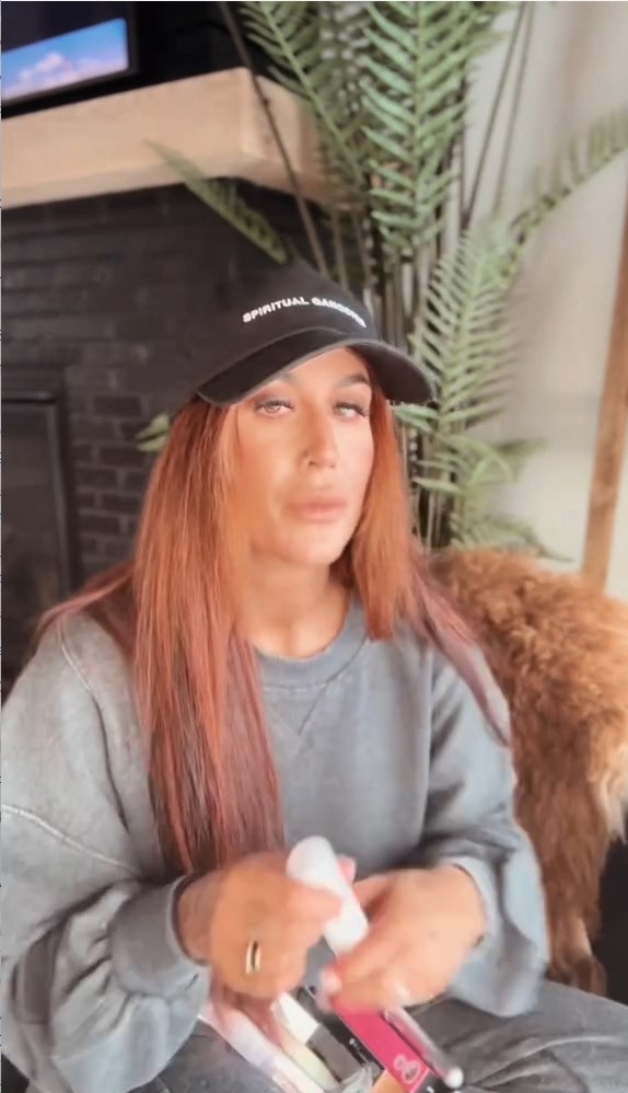 Chelsea showed off her makeup haul and wore a cap that said: 'Spiritual Gangster'