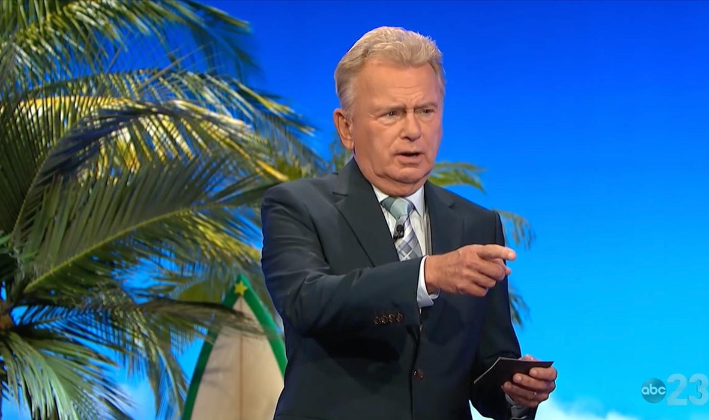 Pat Sajak snarked: 'What are you smiling about? Just tell us what's up there'