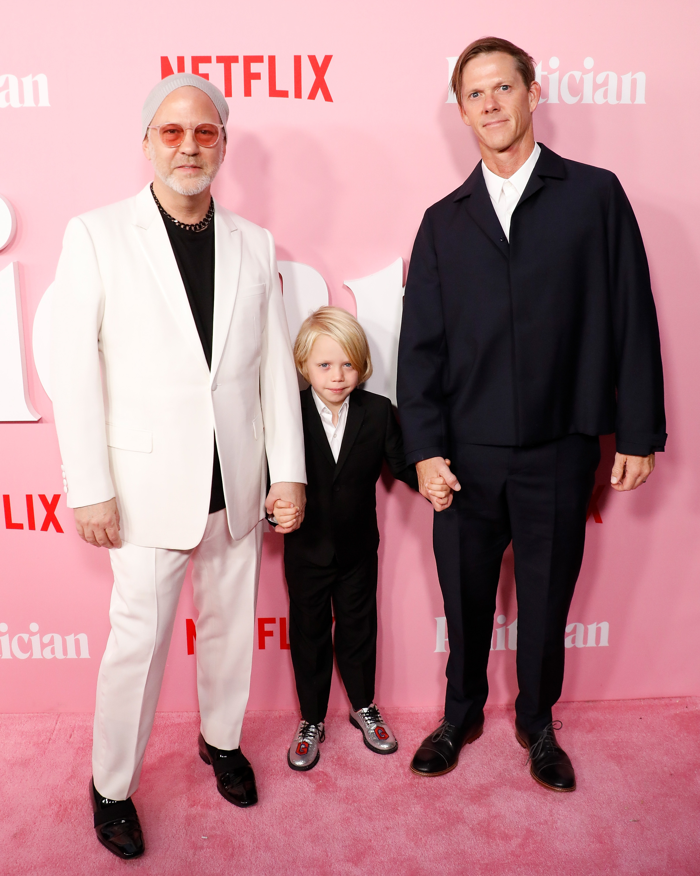 Ryan Murphy and David Miller attend the premiere of Netflix’s “The Politician” with their oldest son Logan Miller at DGA Theater on September 26, 2019, in New York City