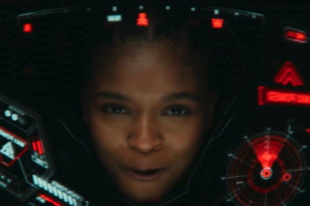 image of ironheart's face in the middle of her suit's helmet display black panther wakanda forever