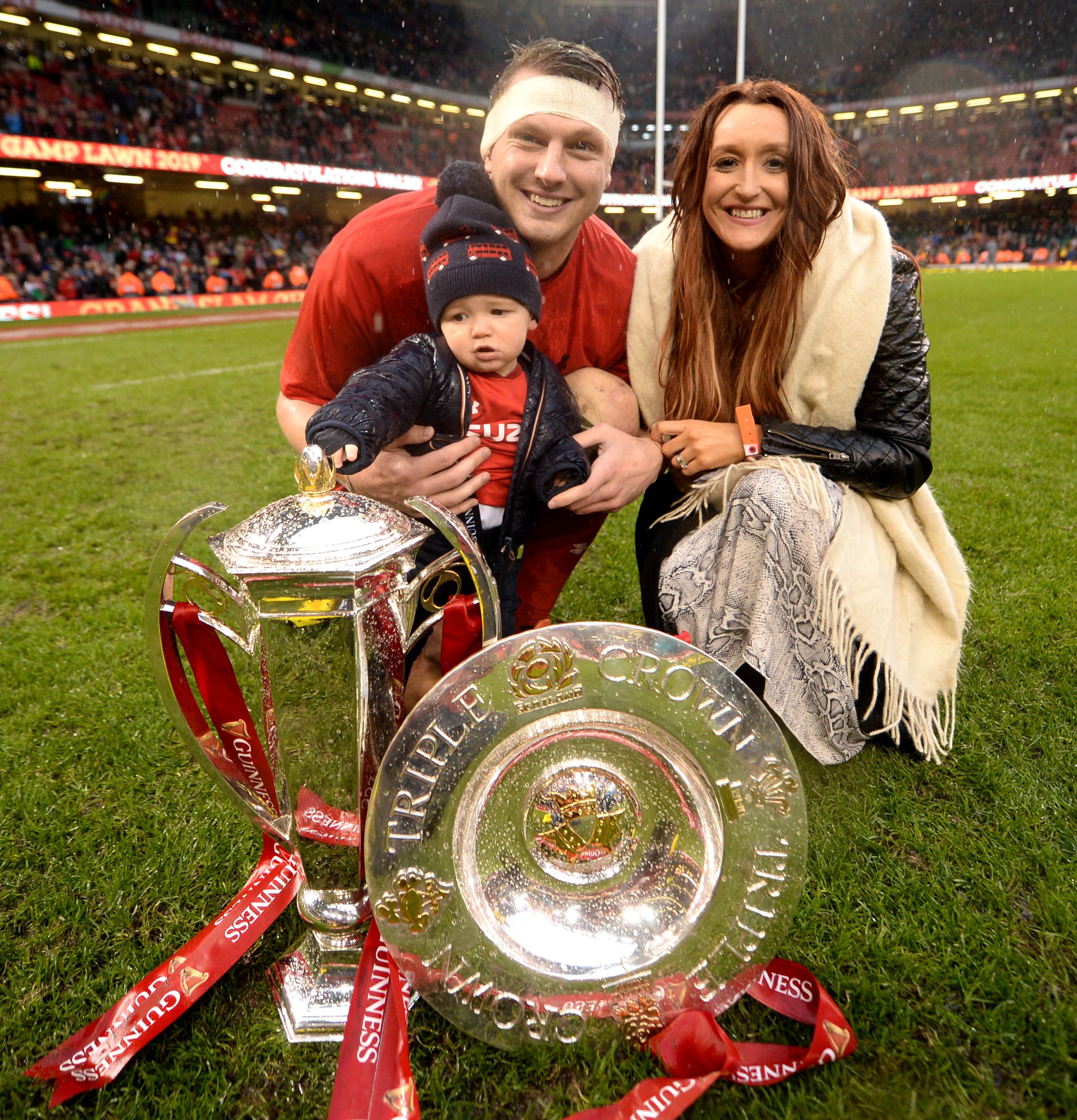 Dan Biggar, pictured with son James and wife Alex in 2019