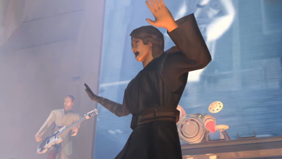 A video game Anakin sings while Obi-Wan Kenobi plays guitar in the background on stage