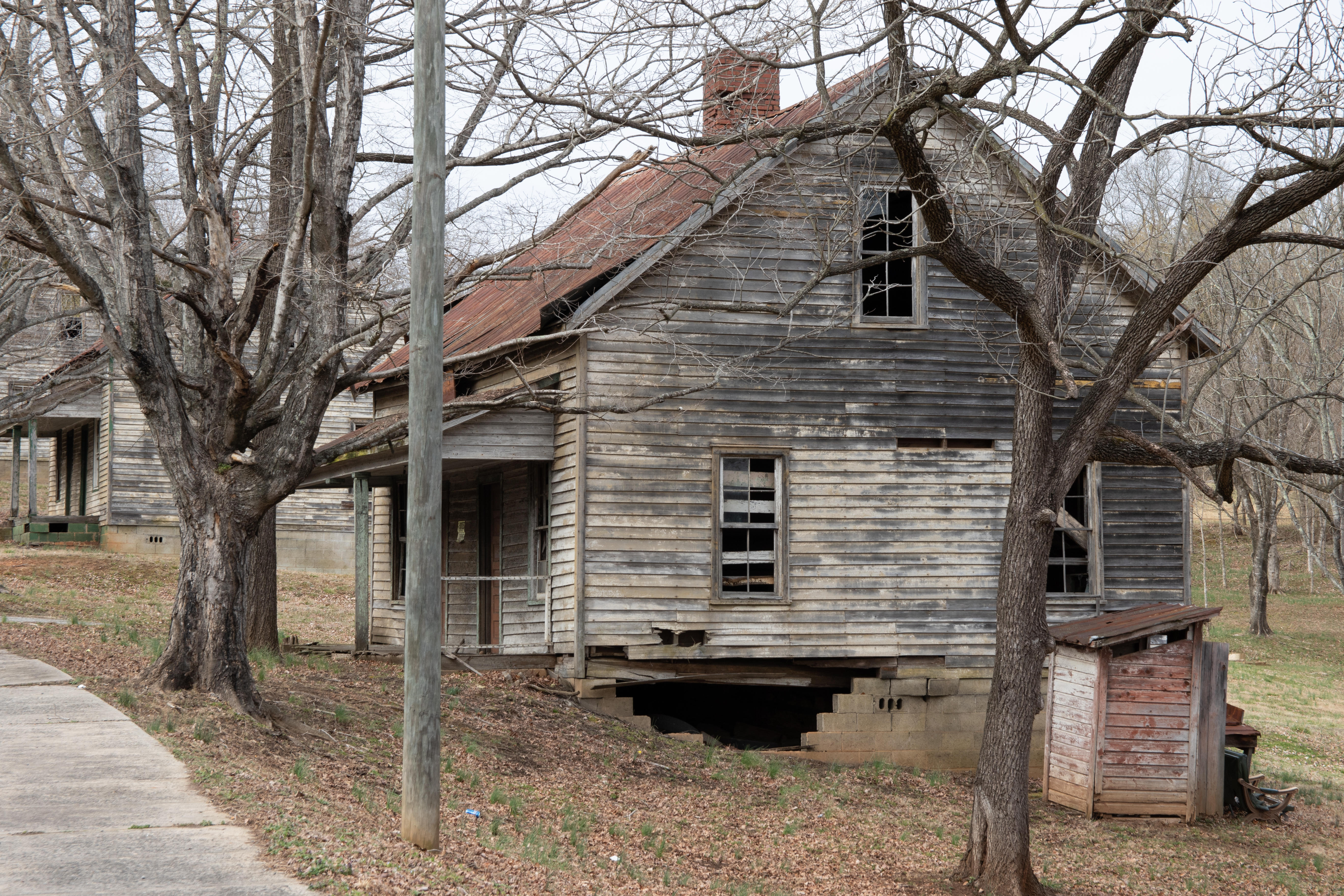 The houses in Henry Mill River Village are ramshackle