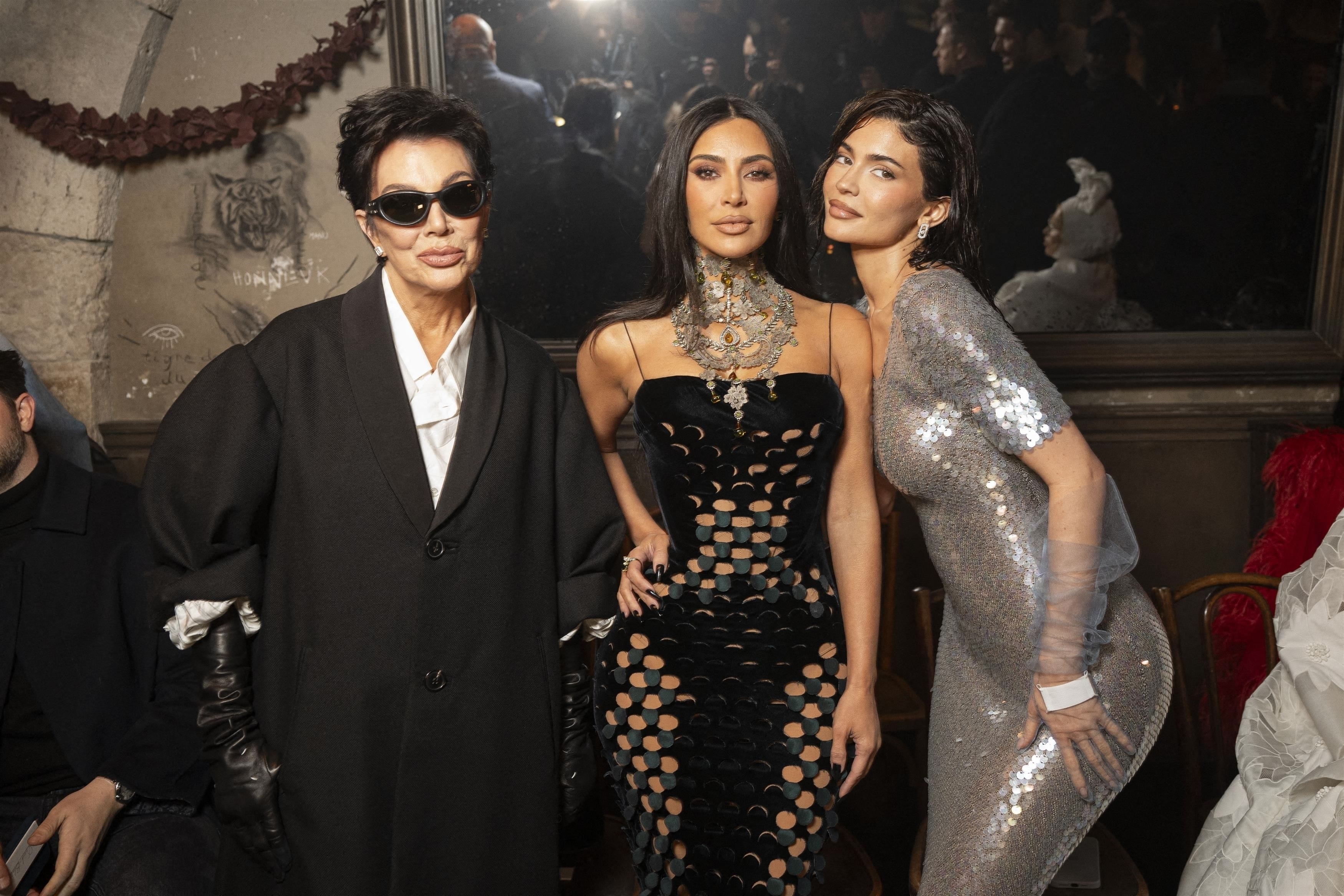 Kim posed with her mother Kris Jenner and sister Kylie Jenner
