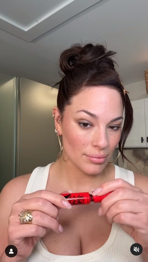 Ashley Graham wore a low-cut top as she opened up about the holidays