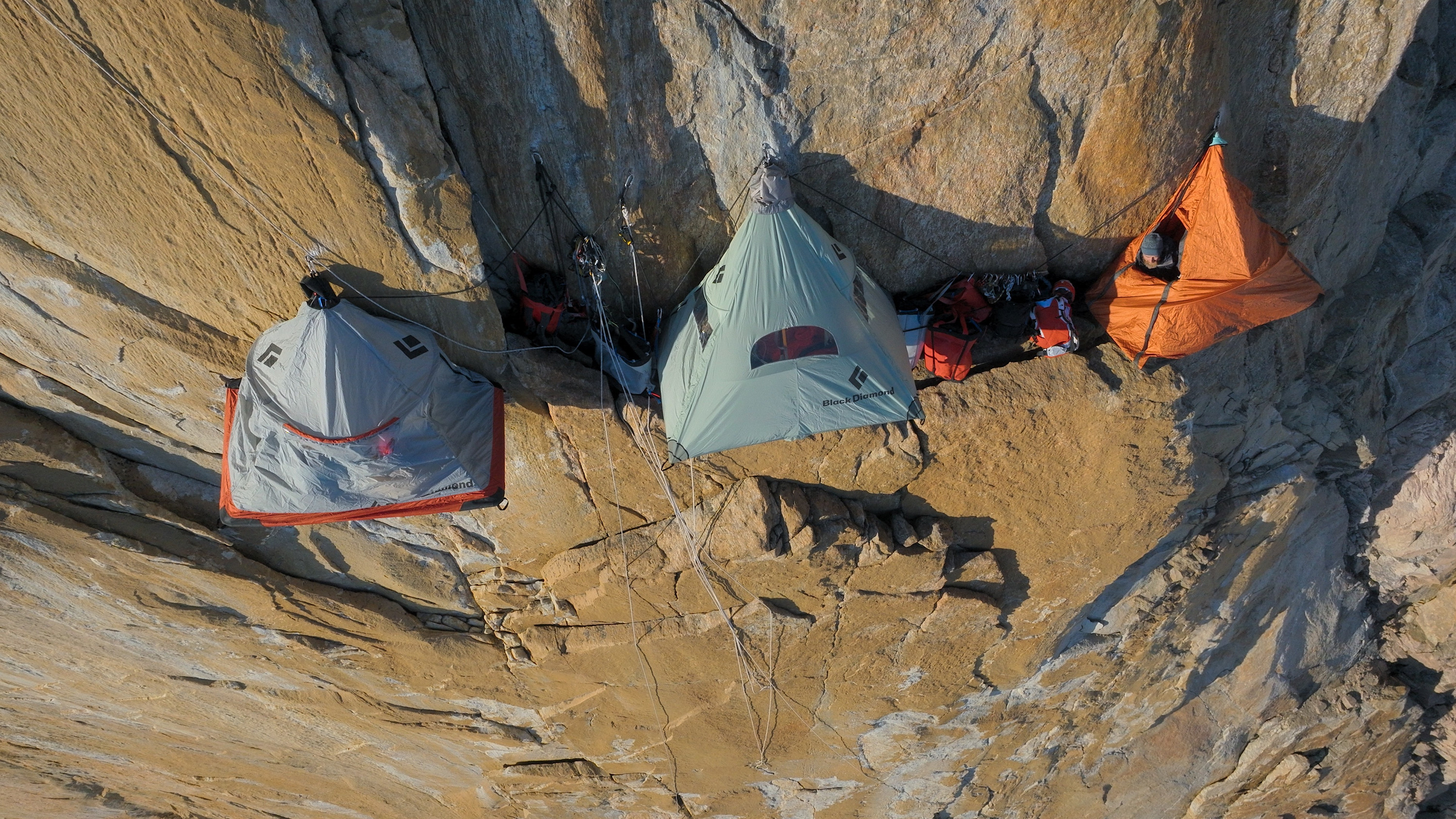 The team pitched their tents on the side of a sheer cliff face in the latest climb