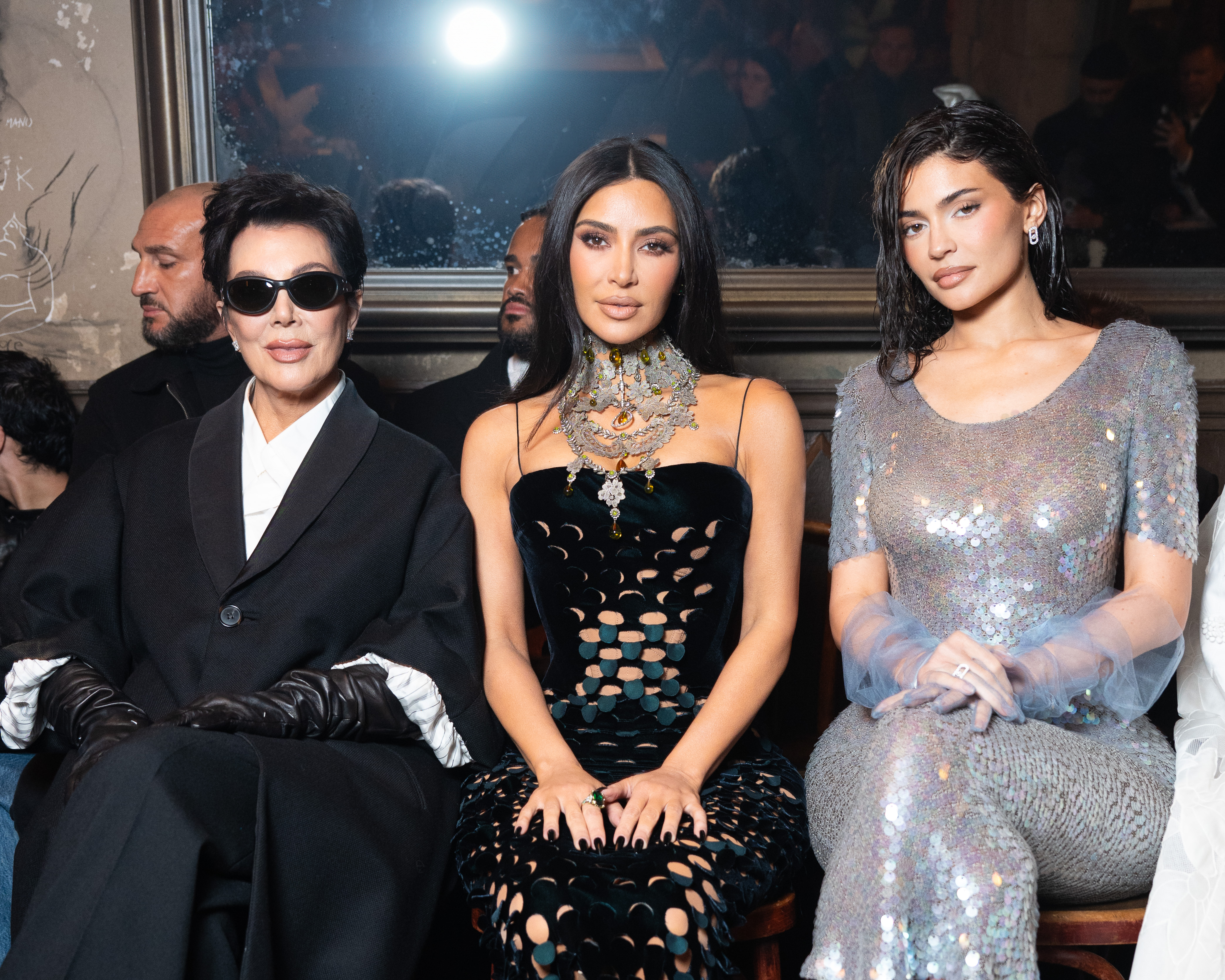 Kris pictured with Kylie Jenner and Kim Kardashian at the Maison Margiela during Paris Fashion Week 2024