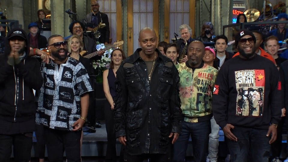 Bowen Yang Couldn’t Get Far Enough Away from Dave Chappelle During ‘SNL’ Goodnight, Speculates Twitter