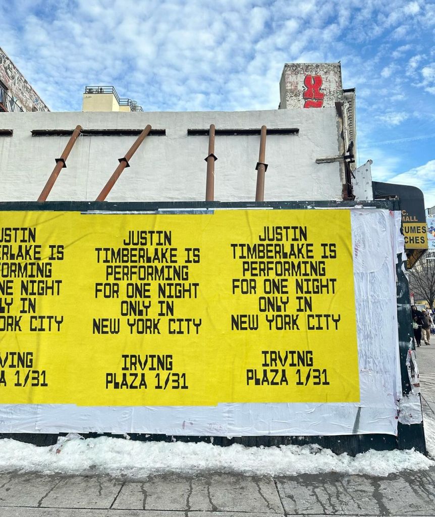An advertisement showing that Justin Timberlake will be performing a free show in New York City.