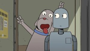 An anthropomorphic cartoon dog sits in a photo booth with a tall, gangly robot, holds up bunny ears over its head, and sticks his tongue out for the camera in the animated feature Robot Dreams