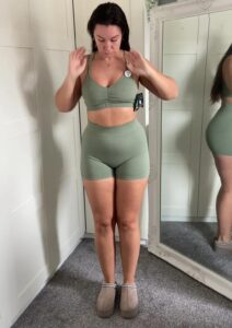 A midsize fashion influencer posed up in the new Primark "scrunch" sets