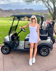Golf influencer Karin Hart stunned fans and rocked a racy outfit as she played golf in rainy weather