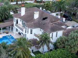 Aerial images show fire damage at NFL star Tyreek Hill's $7 million Florida mansion.