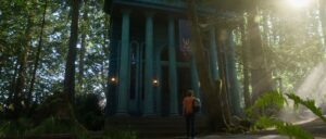 Percy Jackson’s Walker Scobell walks up to a large Greek-style building in the series’ first Disney Plus trailer