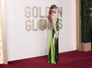 Swift at the Golden Globe awards in a dress which some fans interpreted as an allusion to her Reputation album.