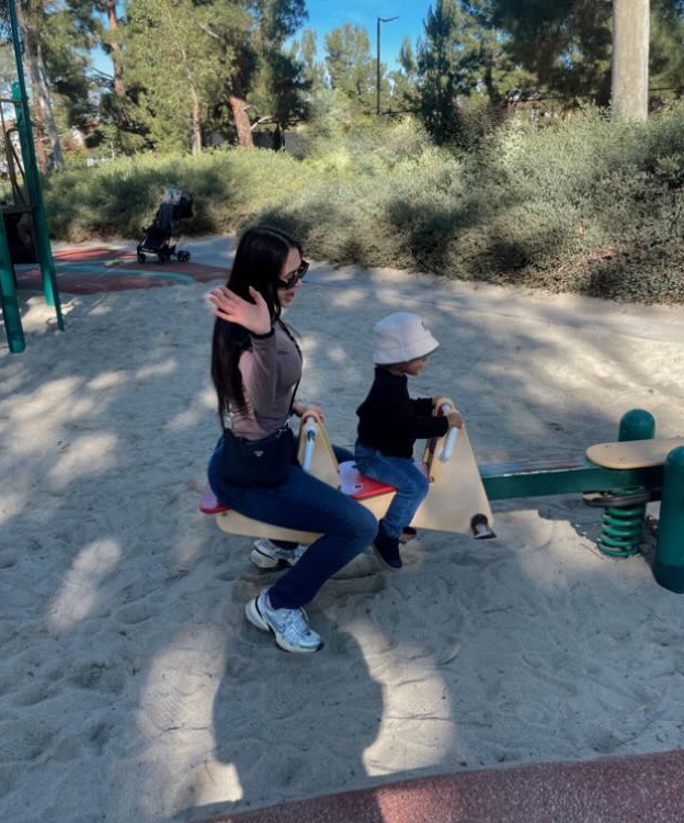 There was also a photo of Maralee and Theo on a playground