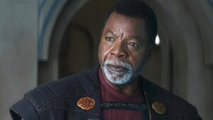 The Mandalorian's Carl Weathers appears as Magistrate Greef Karga looking towards the camera - Carl Weathers passed at age 76