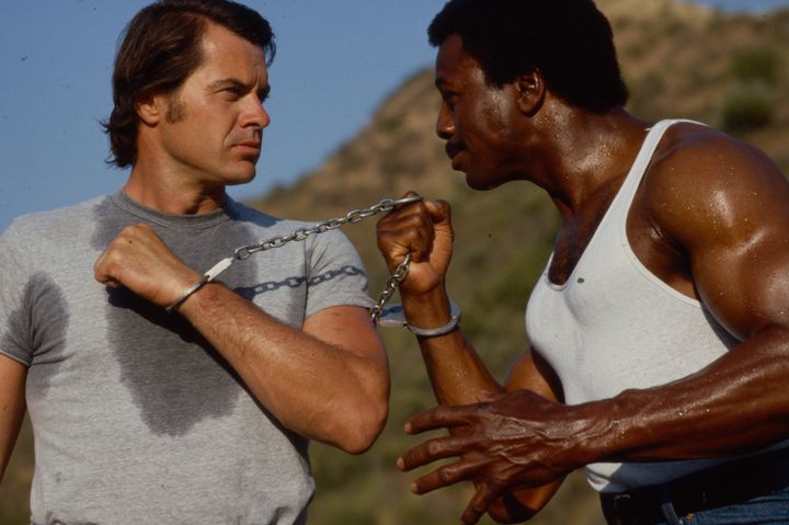 Robert Urich and Carl Weathers appearing in the ABC tv movie 'The Defiant Ones'. (Photo by American Broadcasting Companies via Getty Images)
