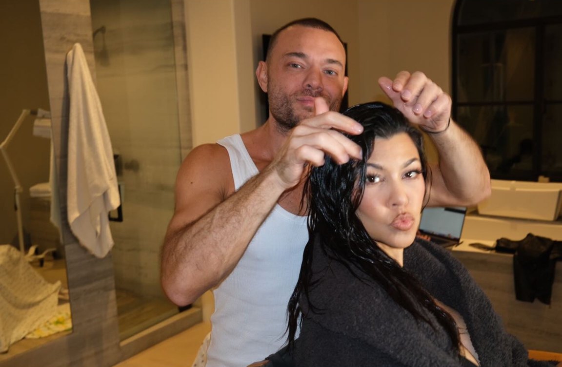 Kourtney pouted at the camera while getting her hair done