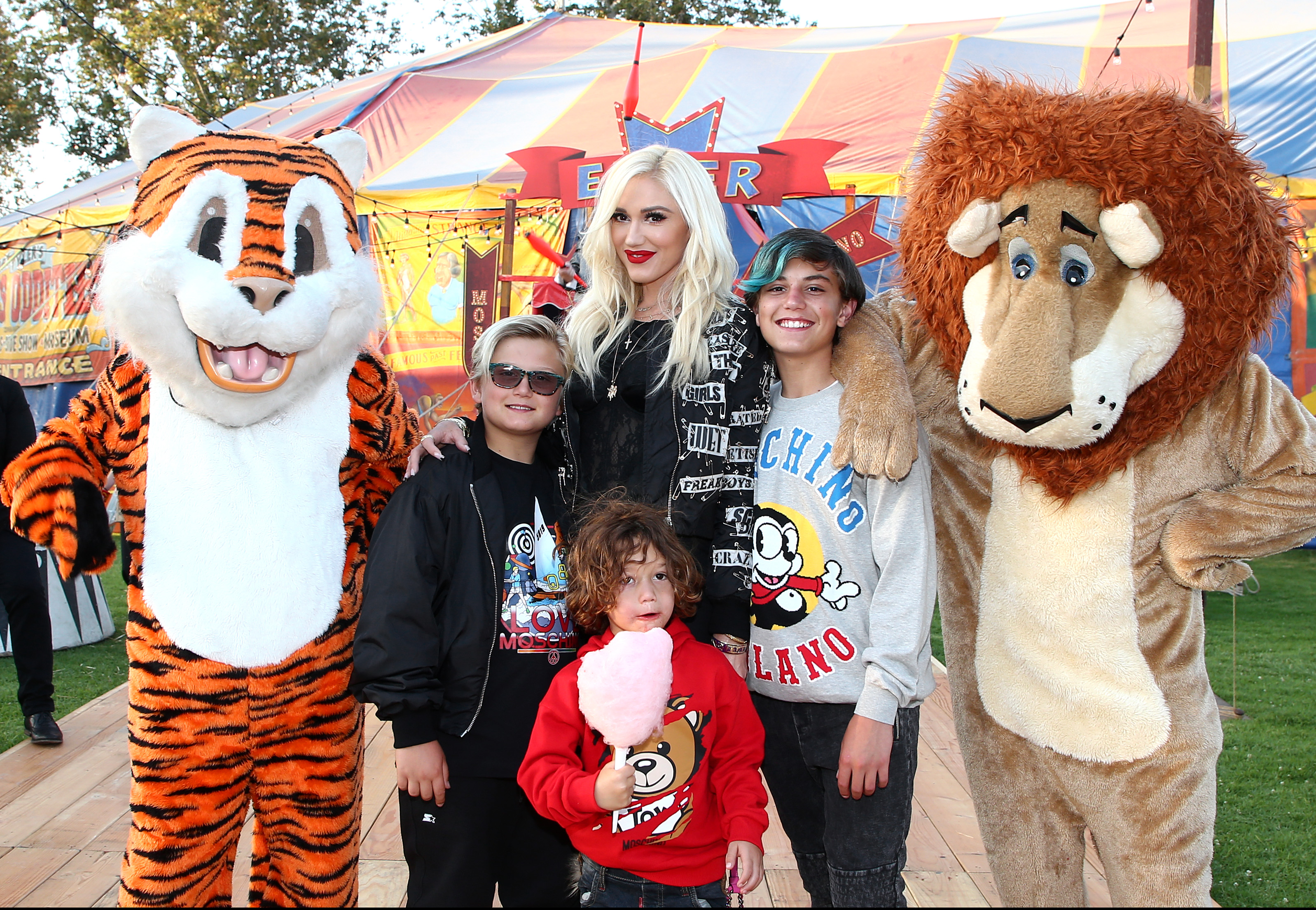 Gwen pictured with her three sons during their early childhood