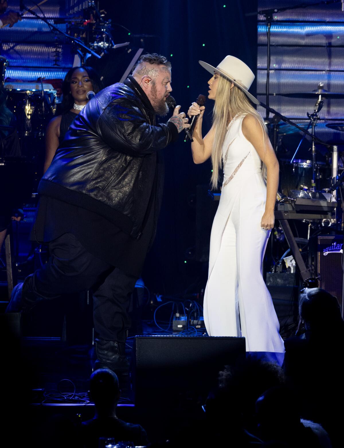 Jelly Roll and Lainey Wilson perform during the 66th Grammy Awards Pre-Grammy Gala.