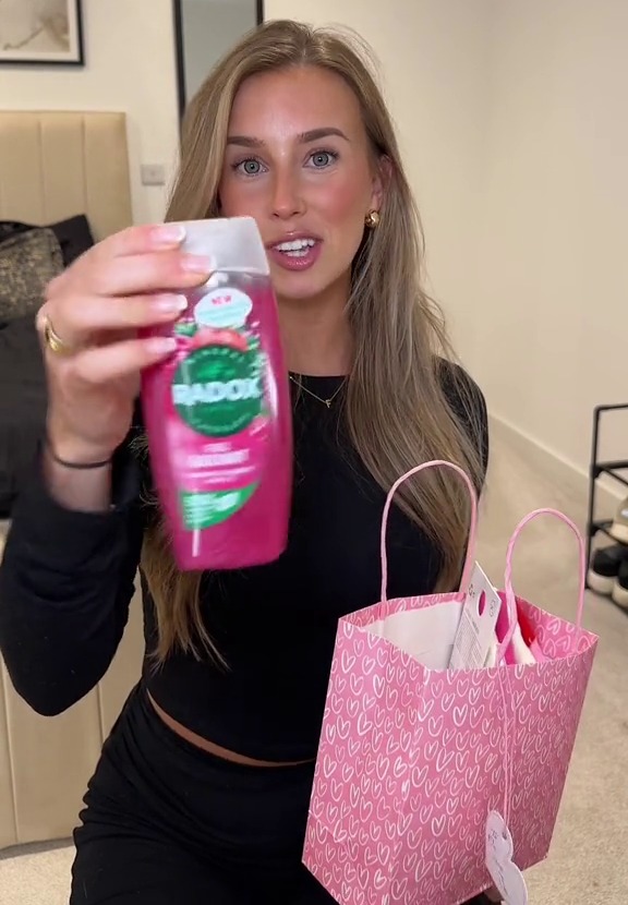She was tickled pink with all the beauty buys she found in her gift bag