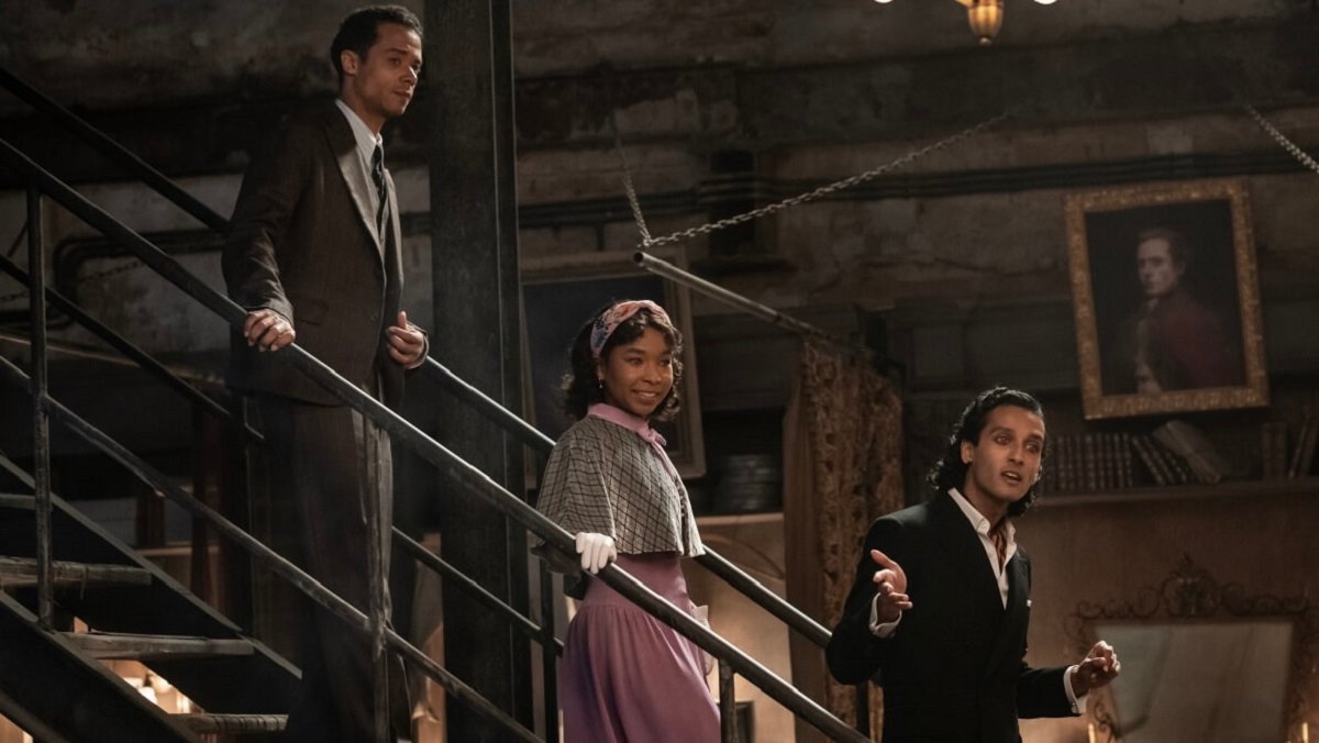 The undead Louis (Jacob Anderson) Claudia (Delainey Hayles) and Armand (Assad Zaman) enter the Theater of the Vampires in Interview with the Vampire season two.