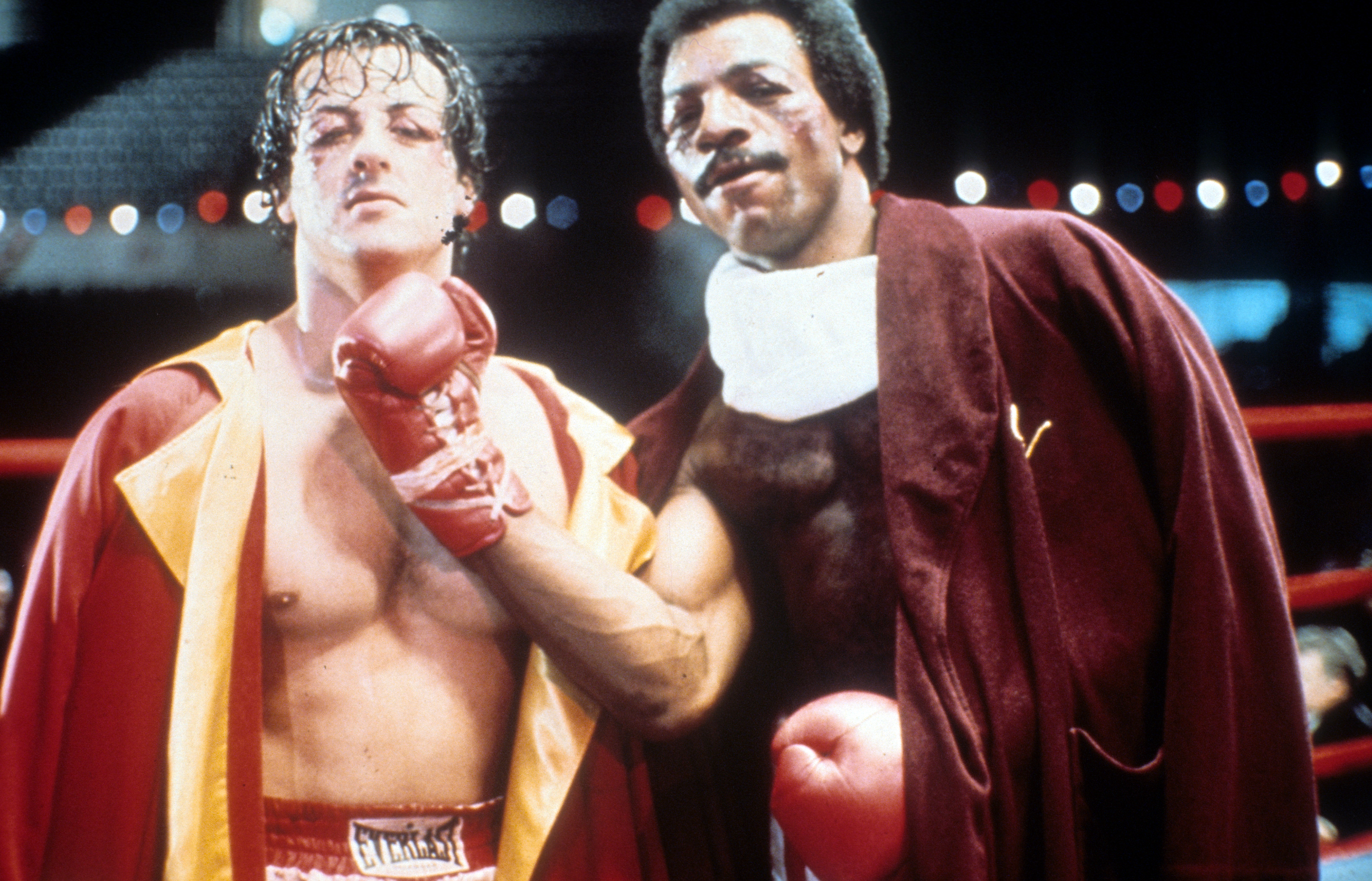 Sylvester Stallone and Carl Weathers on set of the film ‘Rocky’ in 1976