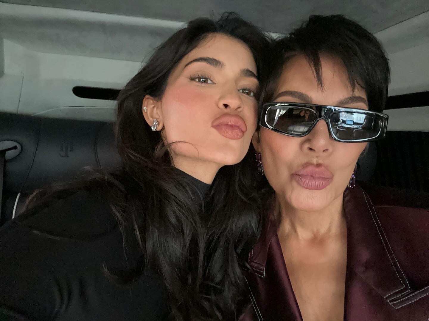 Kylie and Kris pouted their lips as they posed together for a selfie