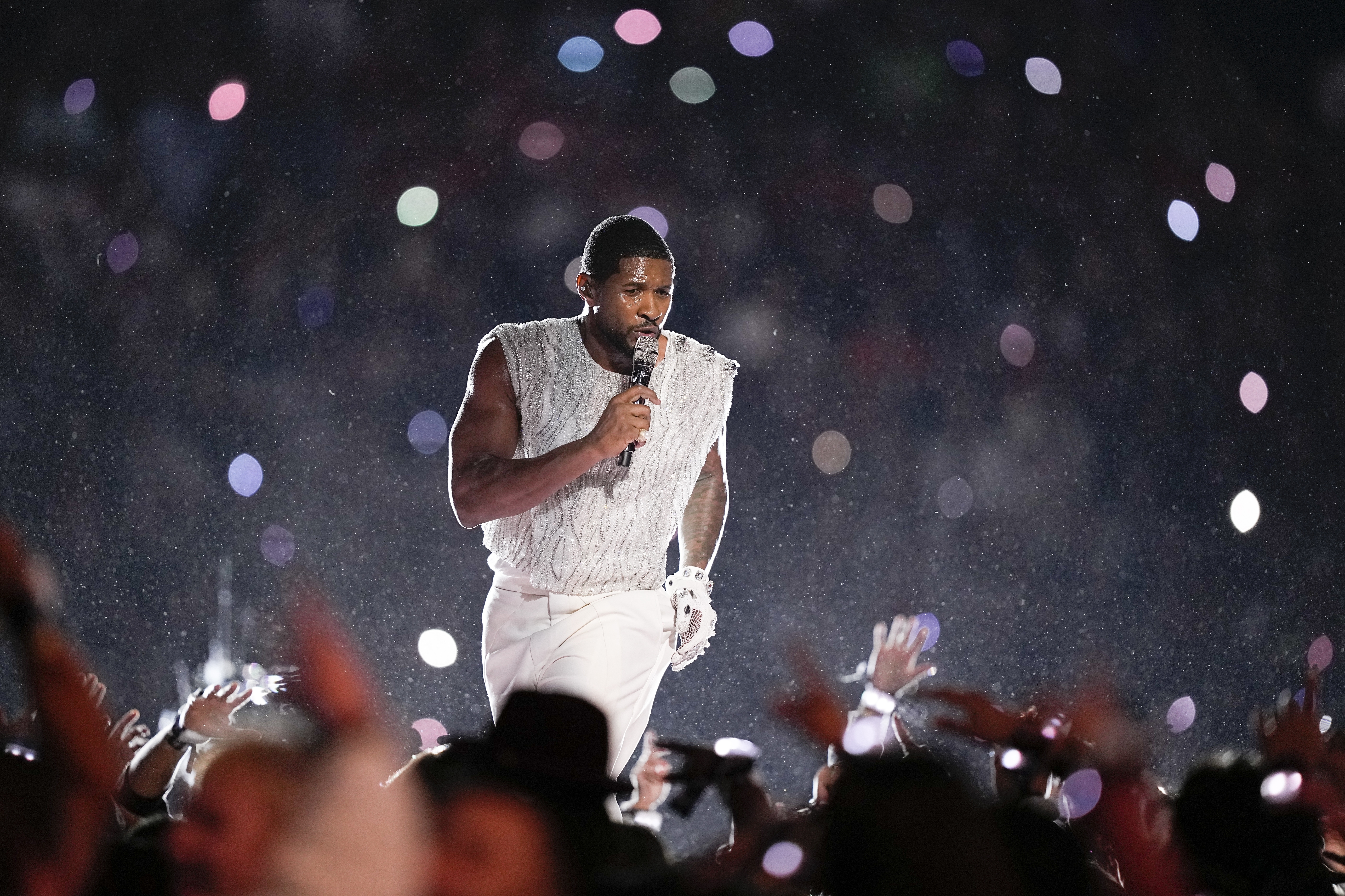 At the beginning of his performance, fans complained that they couldn't hear Usher