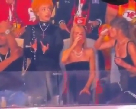 Fans thought they spotted the rapper making 'demonic' horn signs during the game