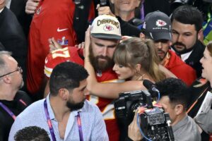 Chiefs tight end Travis Kelce embraces Taylor Swift after defeating the San Francisco 49ers at Super Bowl 58 on Sunday.