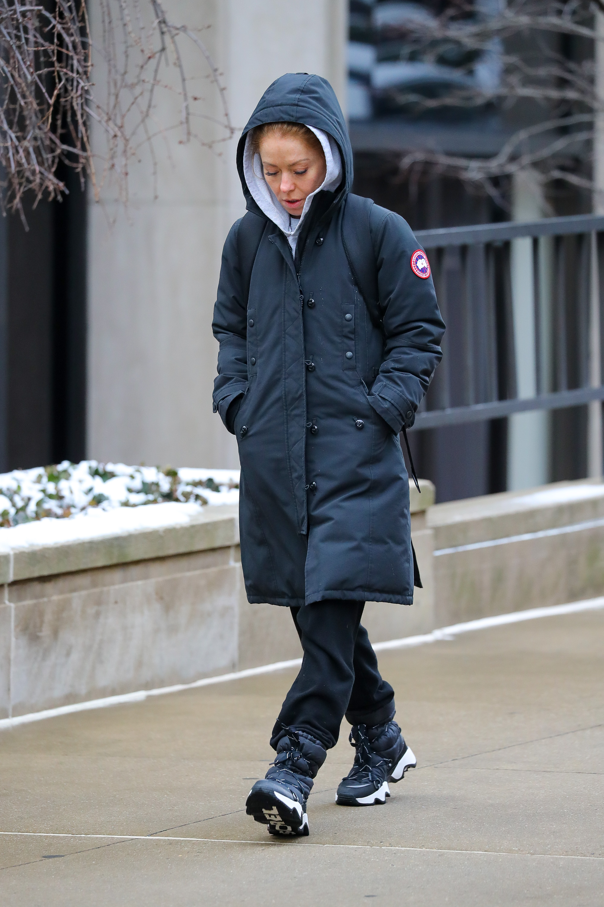 She sported an extremely expensive coat while braving the snow
