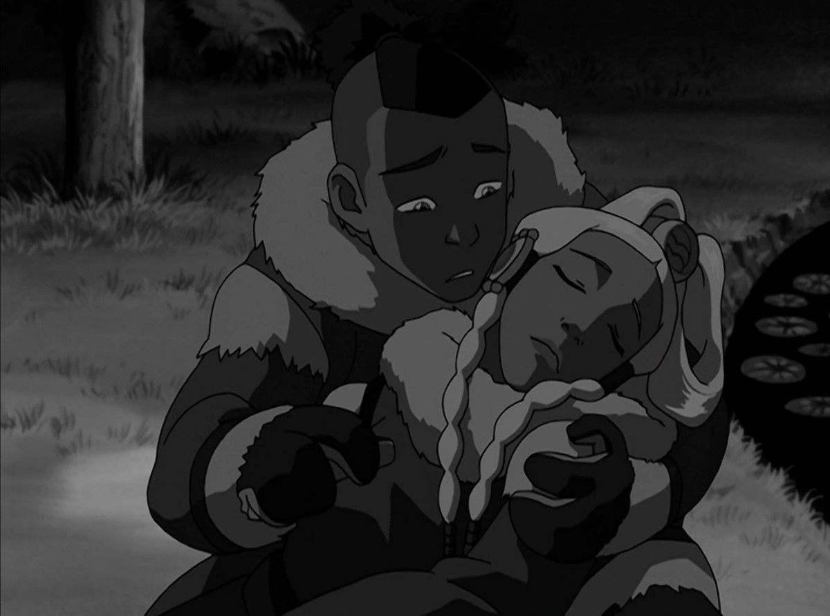 Sokka holding Yue, who’s unconscious, and looking deeply concerned