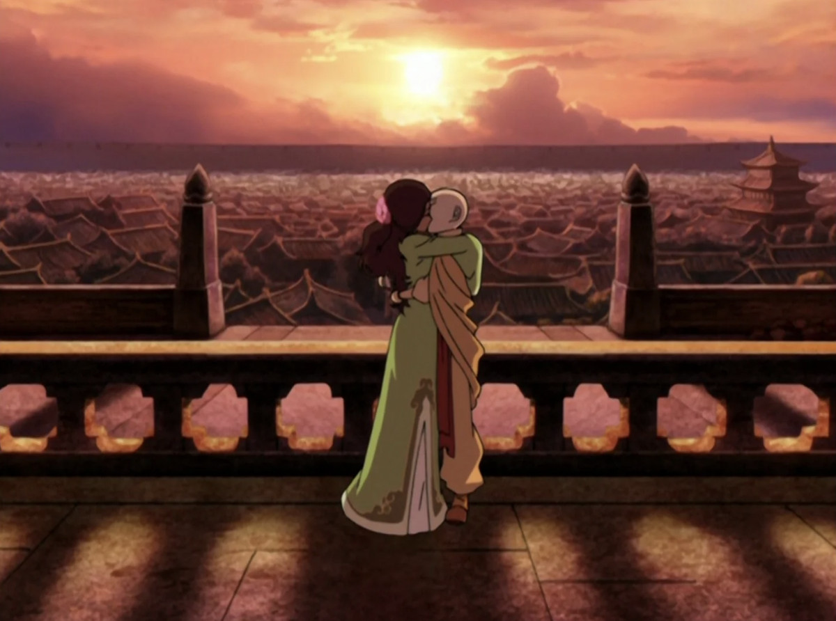 Katara and Aang kiss in front of the sunset