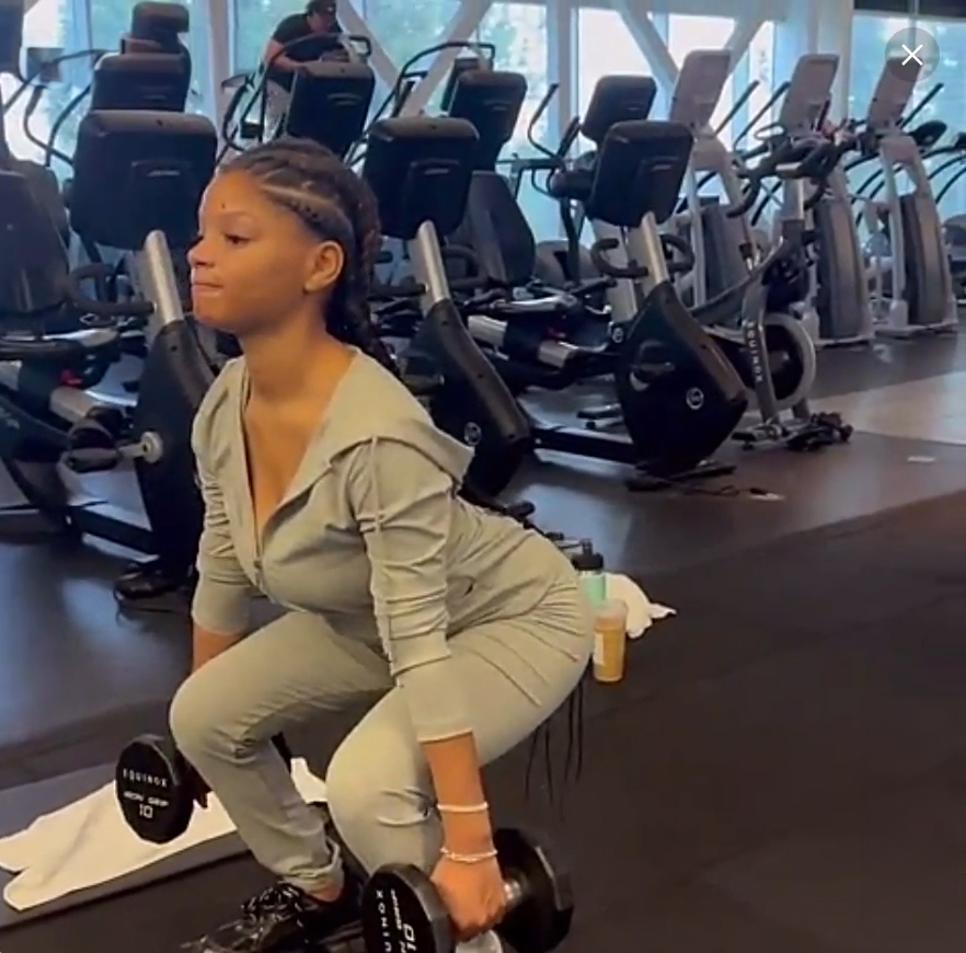 Halle was filmed as she worked out in skintight leggings and a hooded top