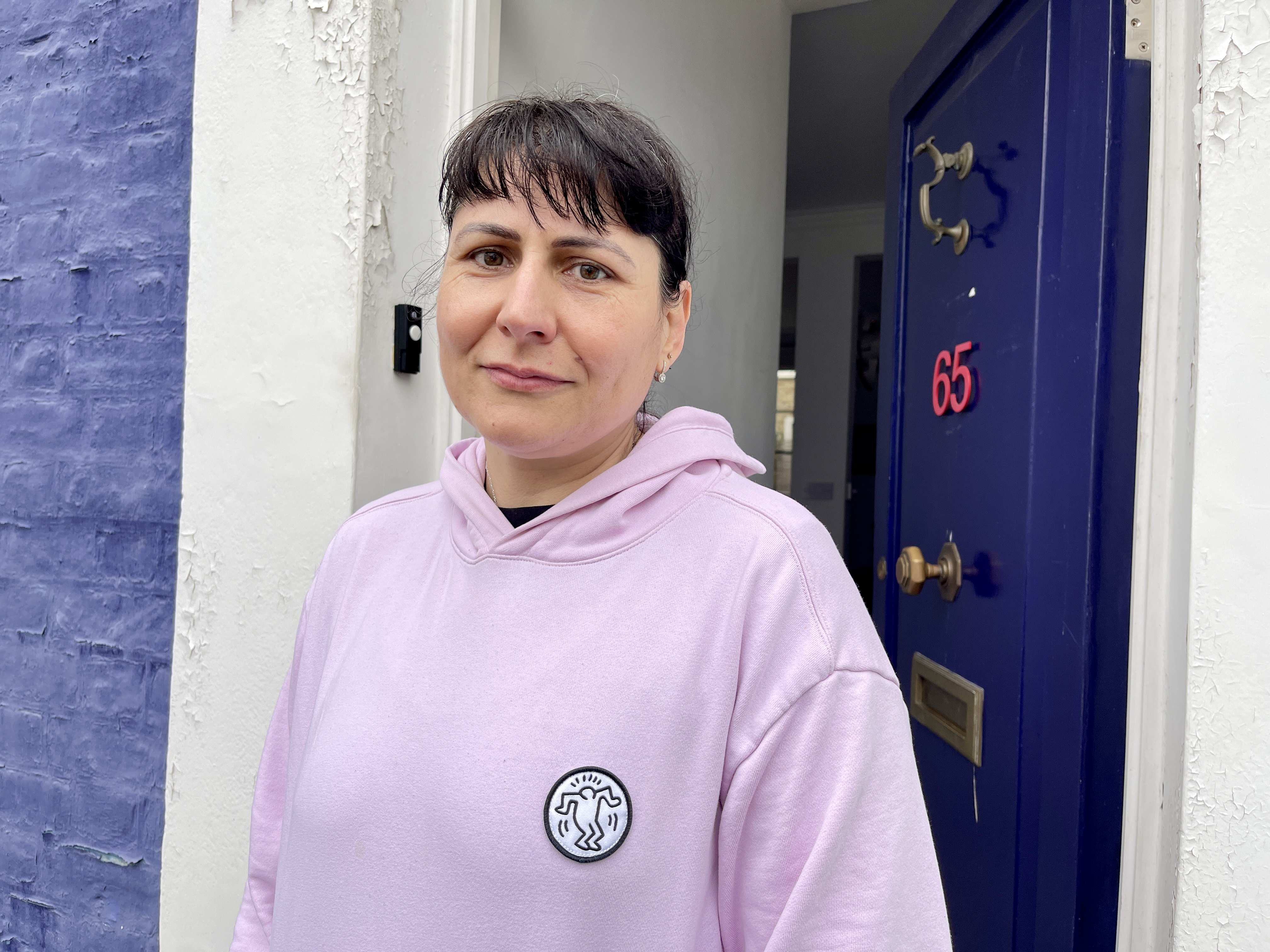 Alex Bonningues, who lives in a purple house, said she once had a tourist shut her door multiple times when she wanted it open