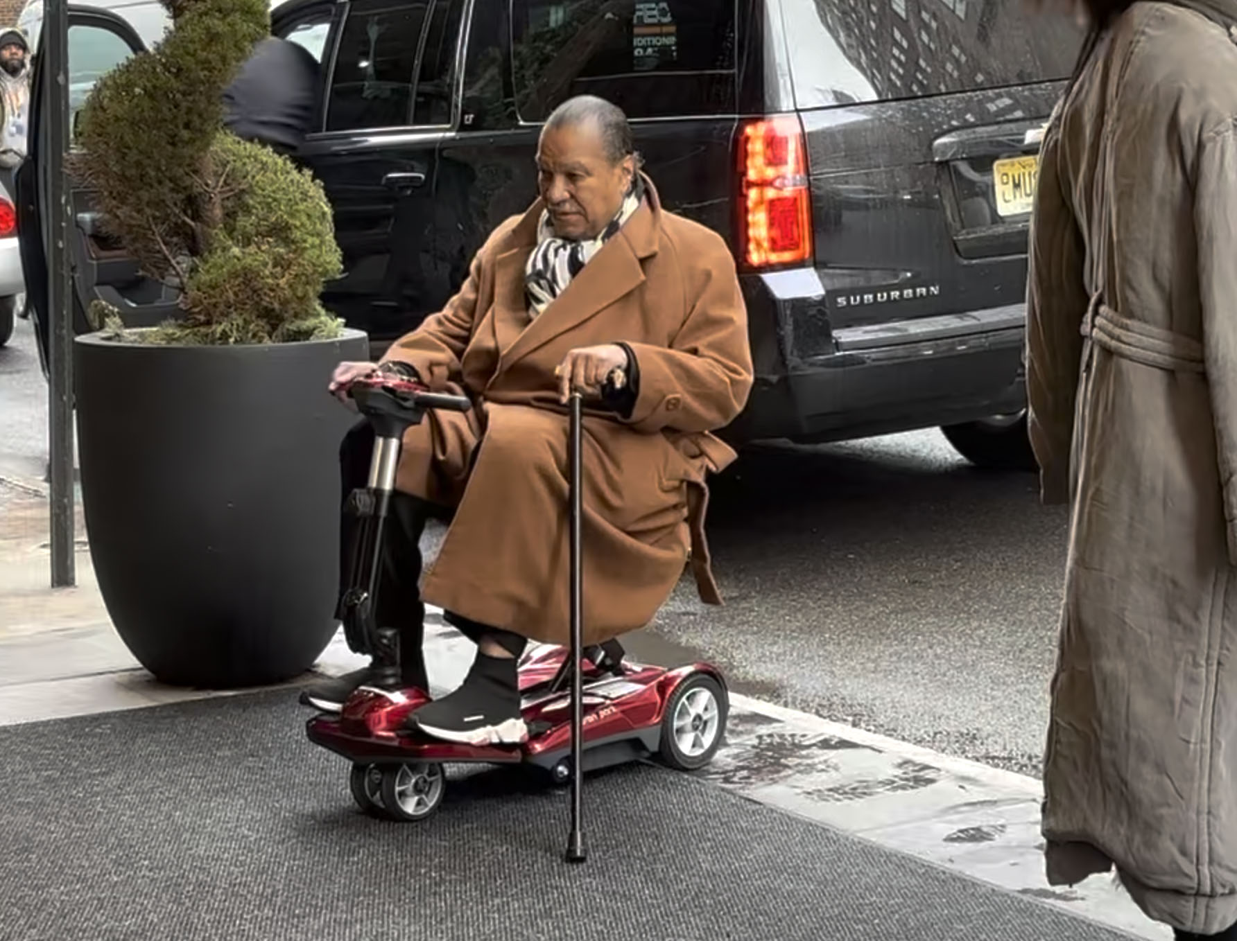 The 86-year-old was unrecognizable in an electric scooter