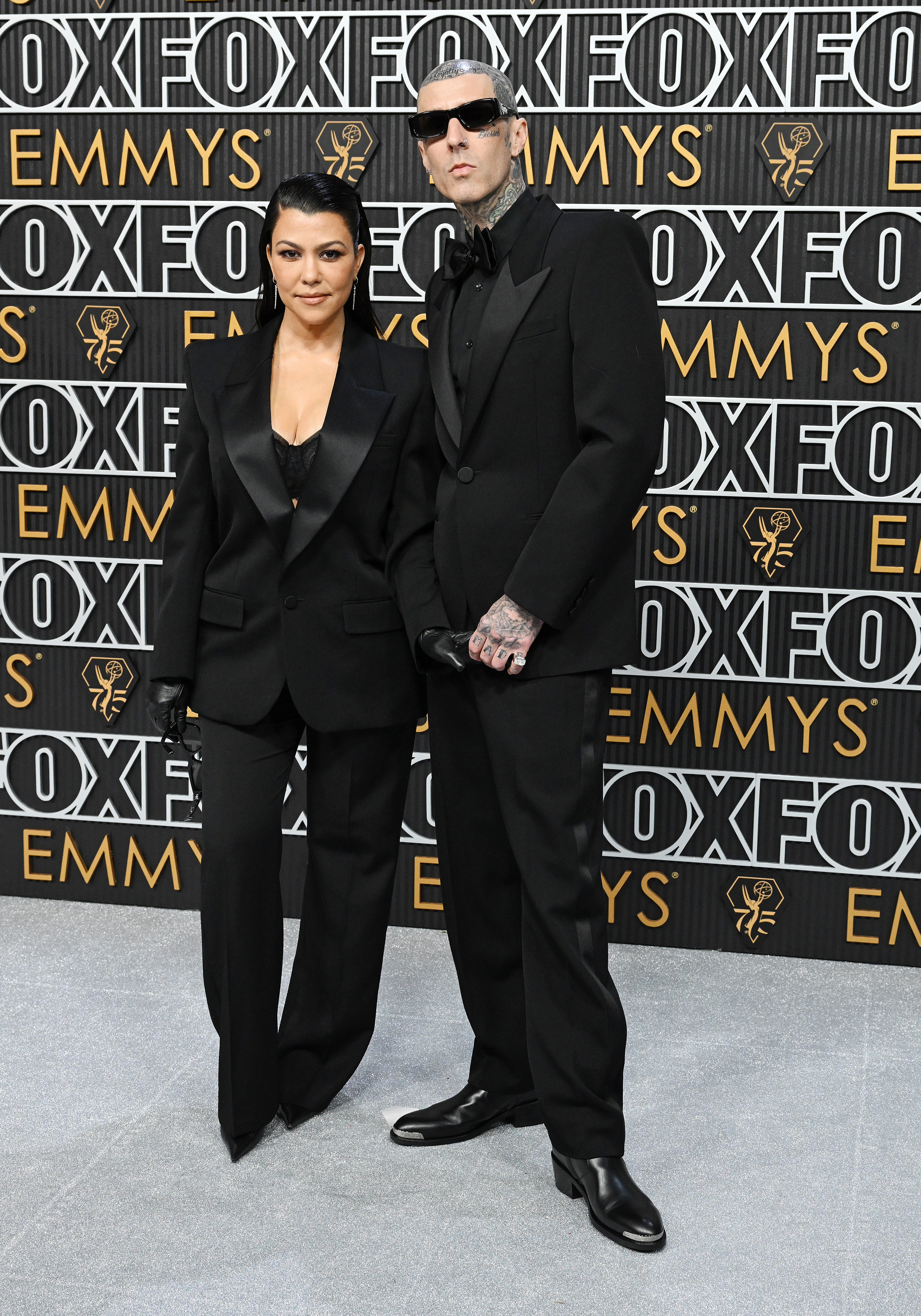 Kourtney and her husband Travis Barker posed together at an event in January 2024