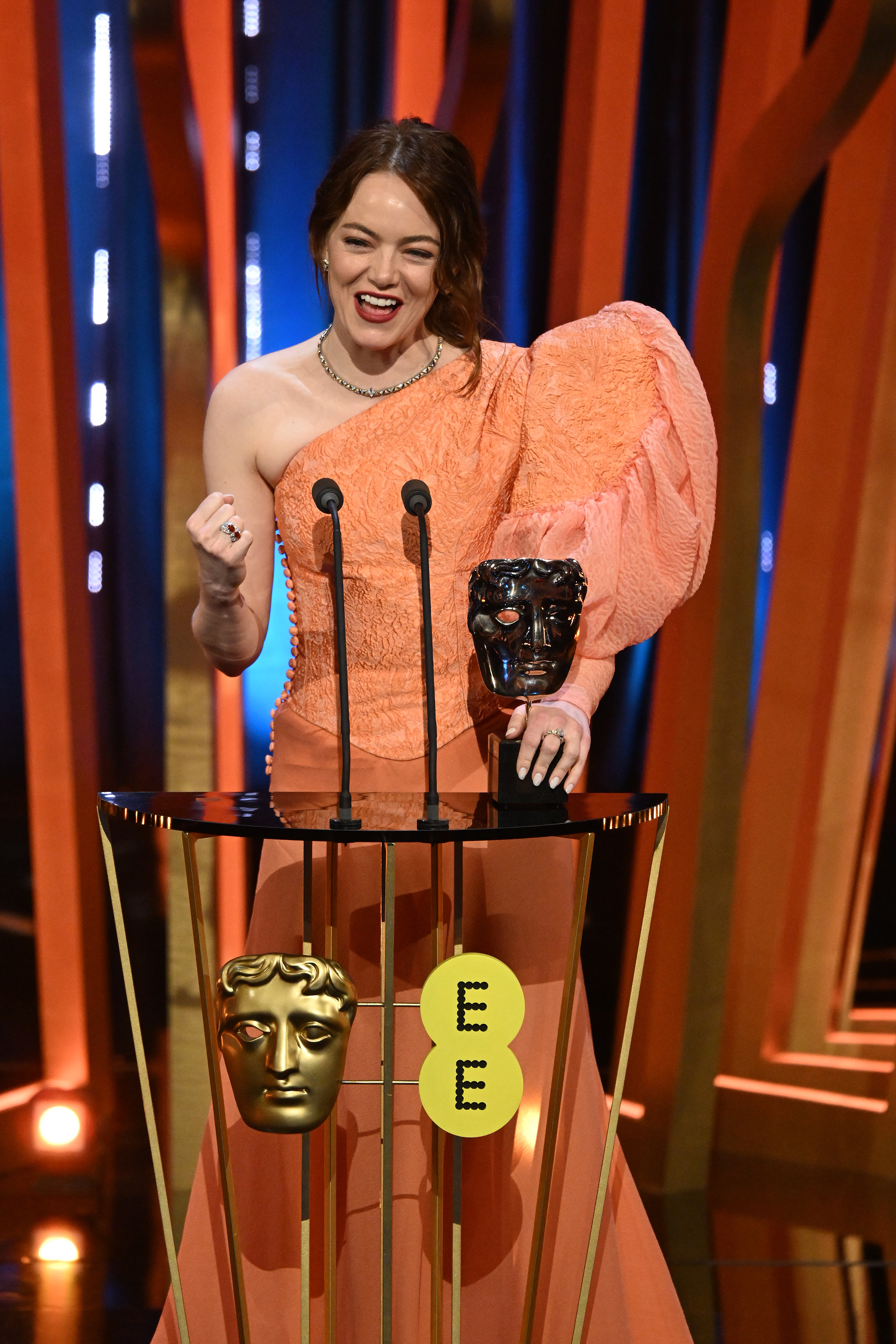 Emma Stone accepts the Leading Actress Award for Poor Things