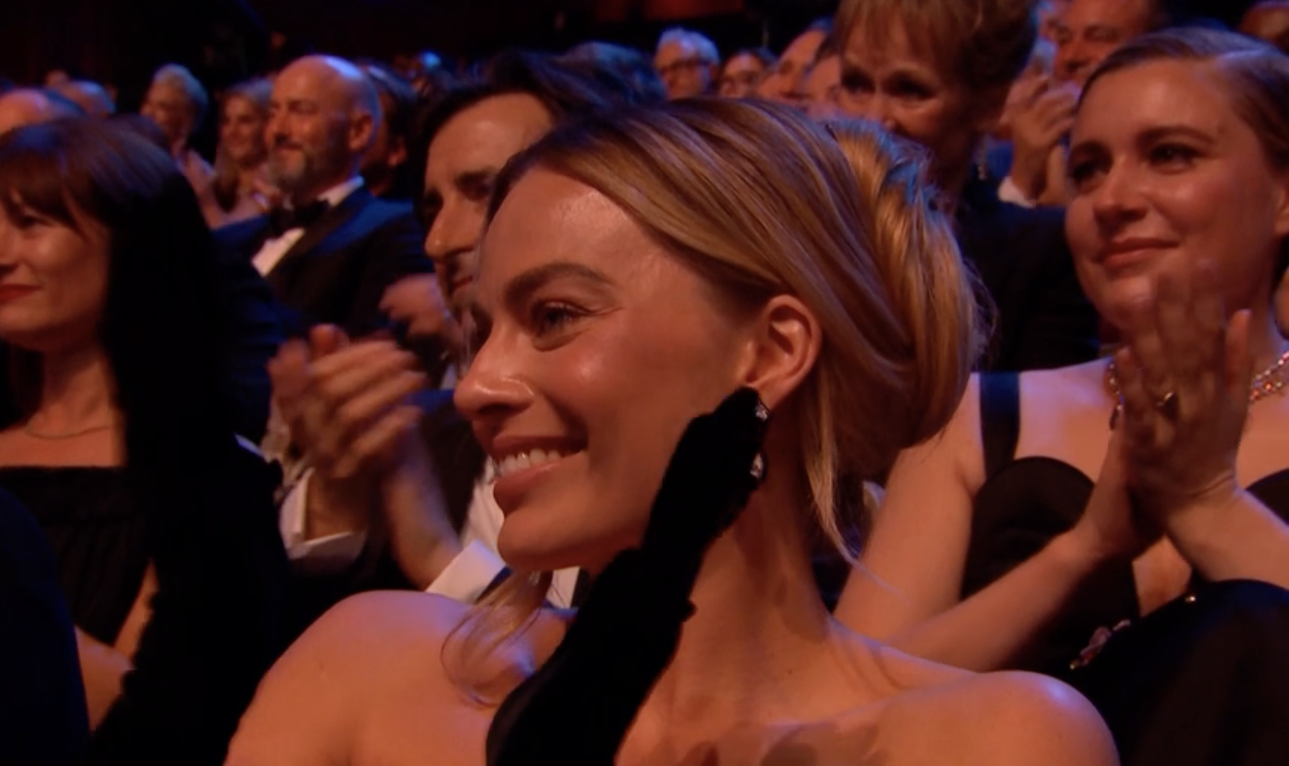 Margot beamed with happiness for her pal Emma Stone