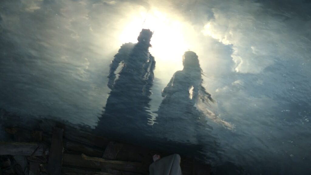 A vision of Sauron and Galadriel as king and queen in the water on The Rings of Power