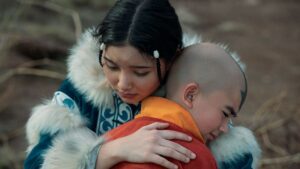 Katara hugging Aang in Avatar the Last Airbender series, one difference between the Avatar cartoon and live action article is in Aang's story