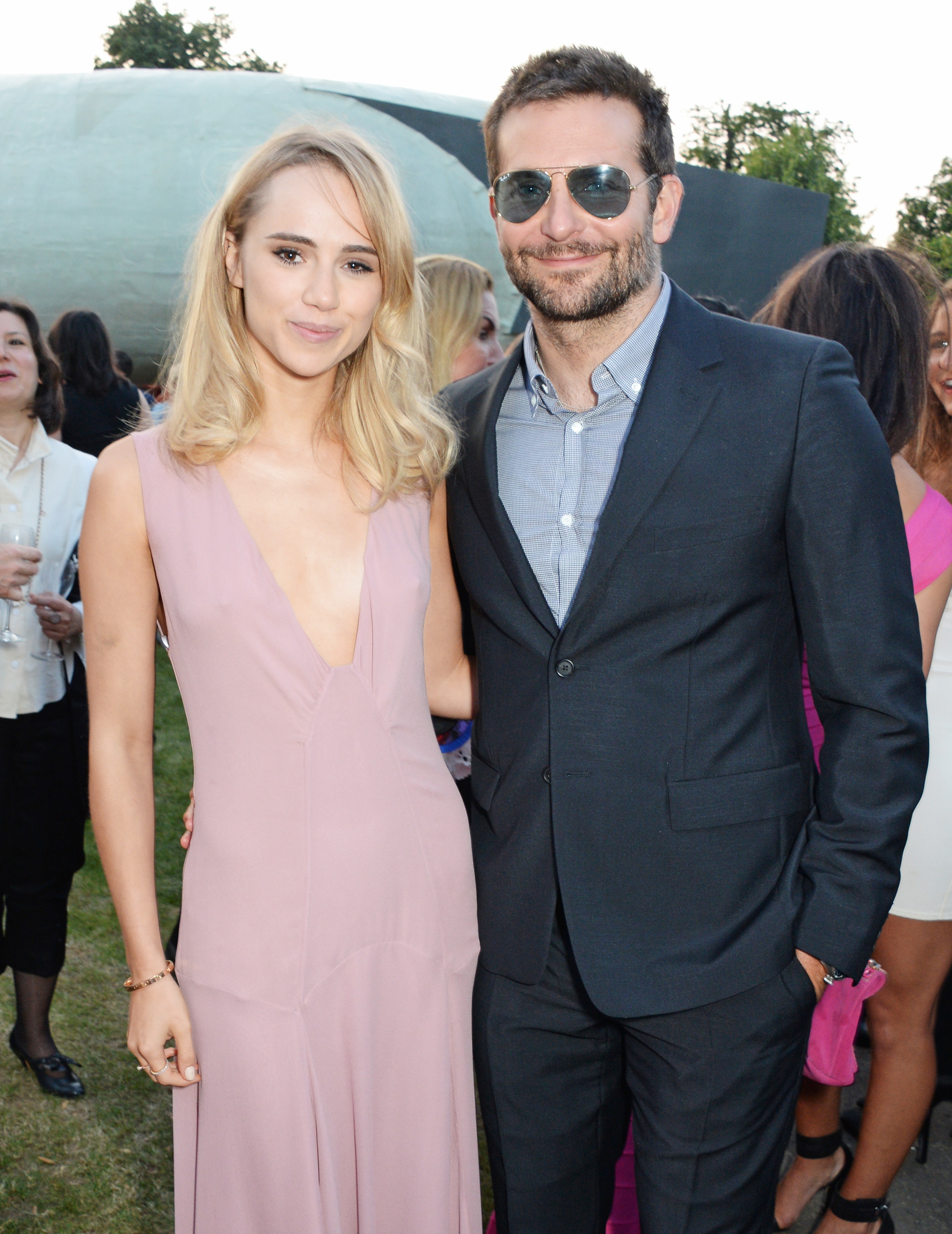 Suki Waterhouse and Bradley Cooper attend The Serpentine Gallery Summer Party co-hosted by Brioni at The Serpentine Gallery on July 1, 2014, in London, England