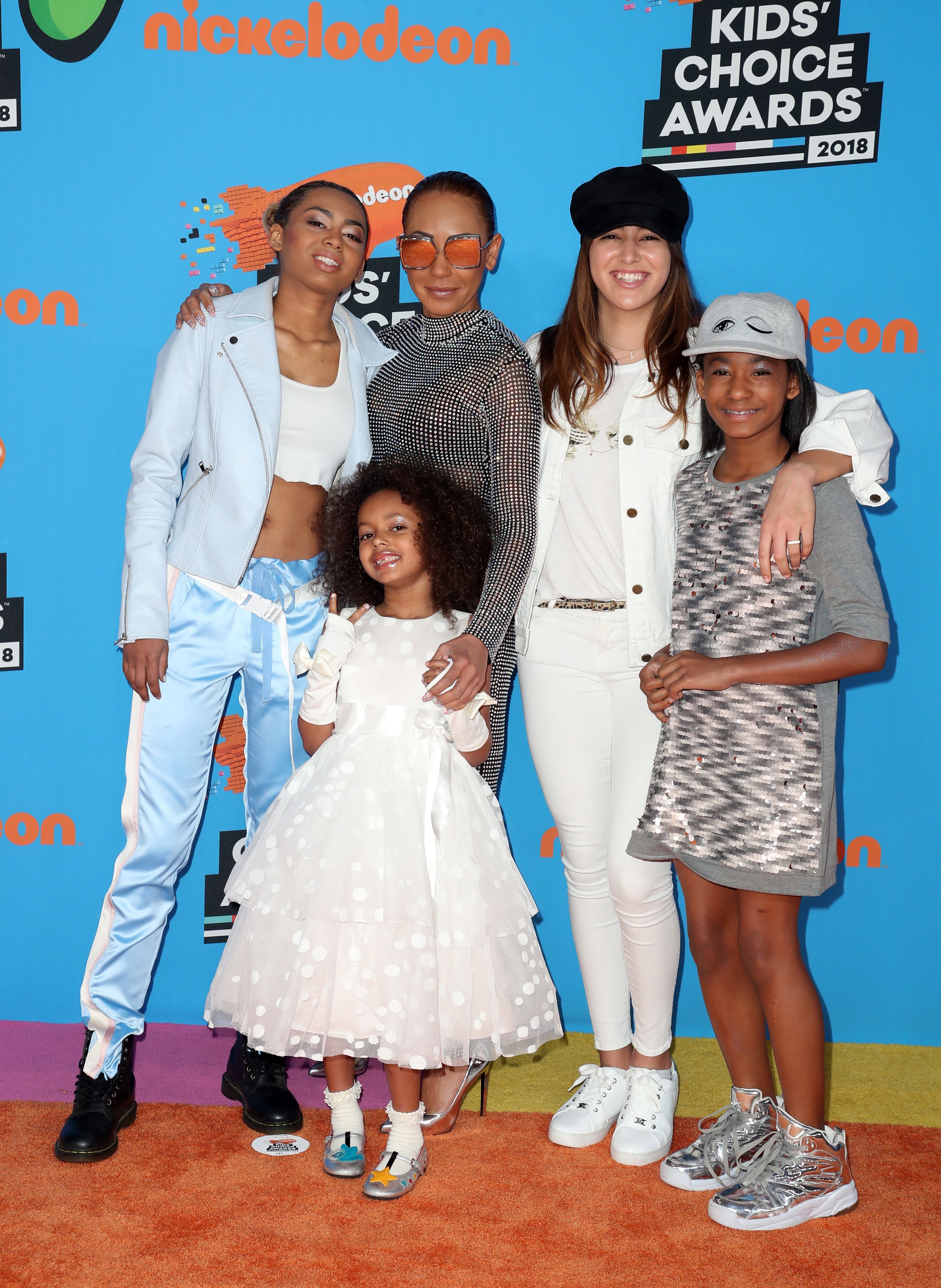 Mel with her kids, and Stephen’s daughter Giselle in 2018